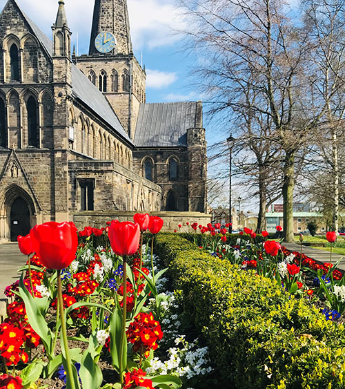 A flowerbed in St Cuthbert's churchyard