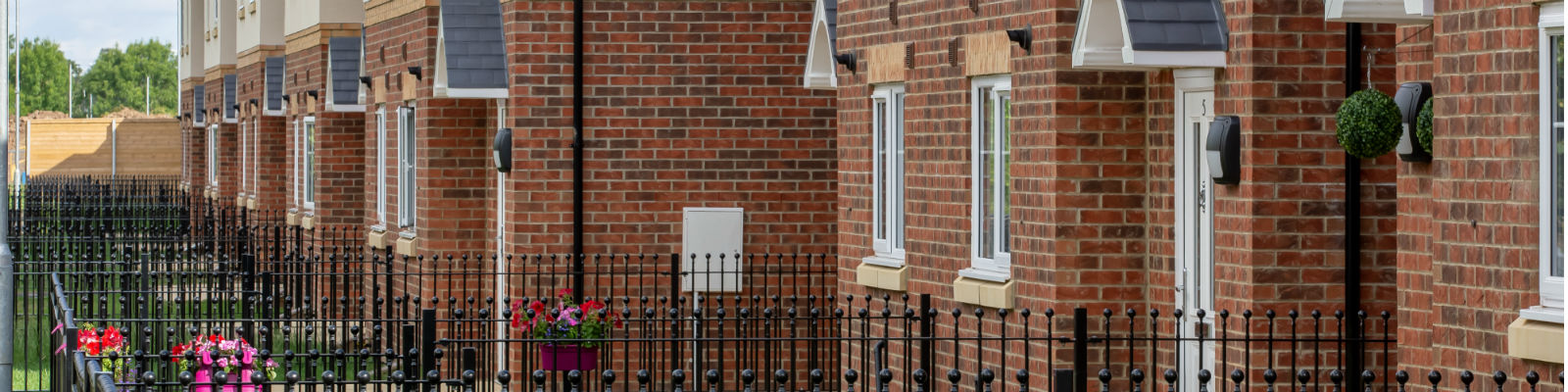 a view across new build front gardens